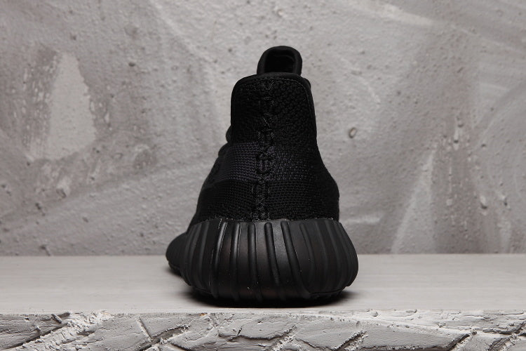 Yeezy Boost 350 V2 Sneakers in Black Knit - product image from the listing.