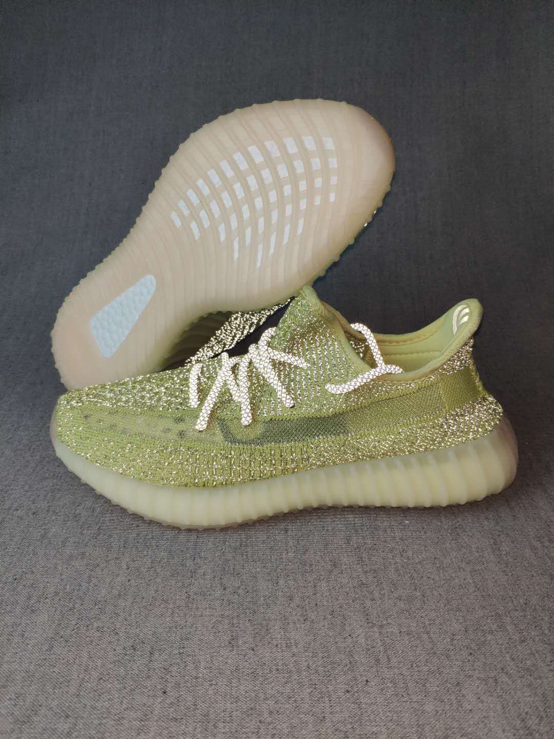 Olive Green and Cream Yeezy 350 V2 Knit Sneakers - product image from the listing.