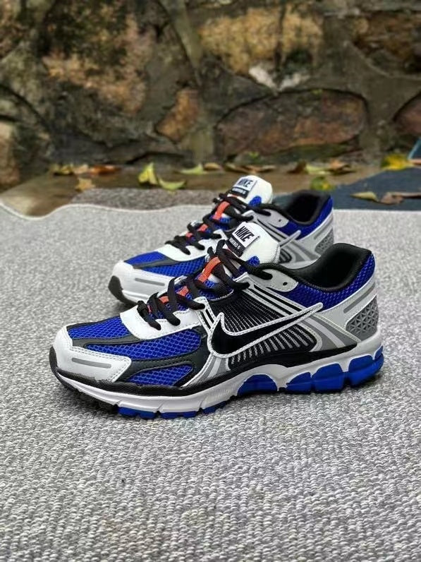 Nike Zoom Vomero 5 Sneakers in Black White Blue - product image from the listing.