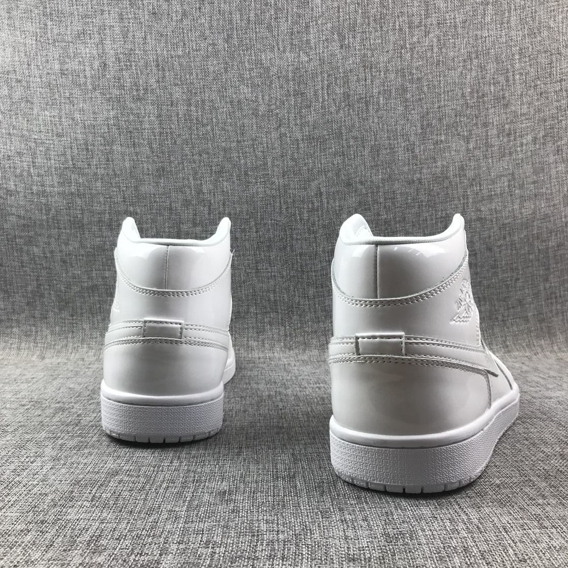 Air Jordan 1 Mid White Patent-Style Sneakers BQ6472-111 - product image from the listing.