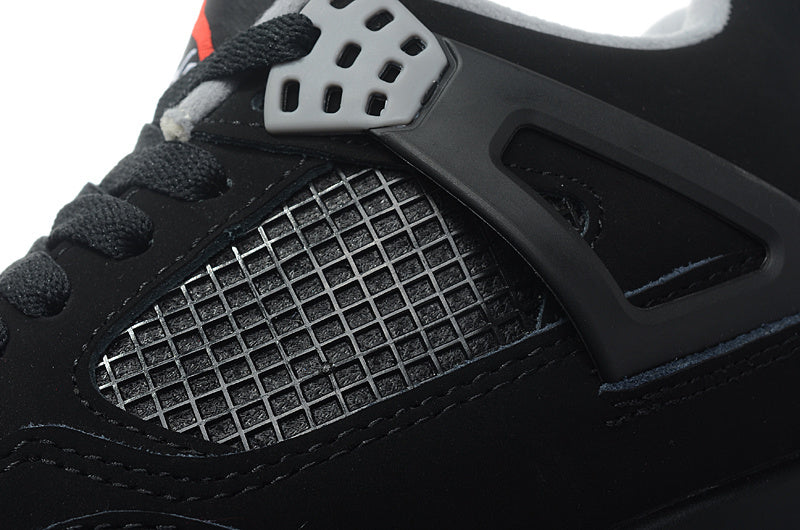 Jordan 4 Retro Basketball Shoes in Black/Red - product image from the listing.