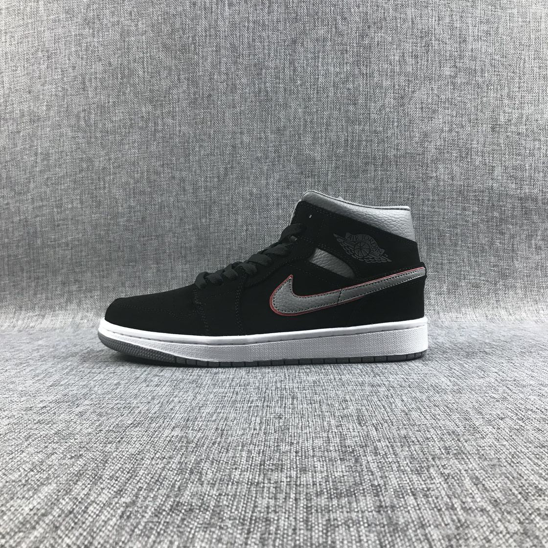 Air Jordan 1 Mid Sneakers in Black Grey Red 554724-060 - product image from the listing.