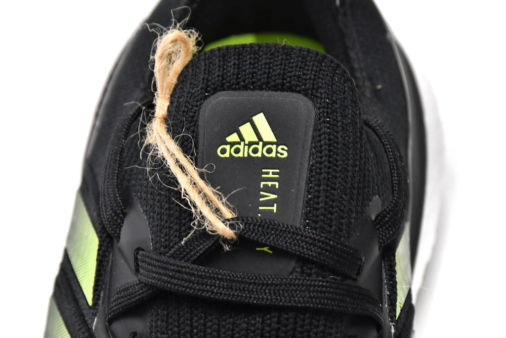 adidas UltraBoost 22 H01172 Running Shoes in Black Green - product image from the listing.