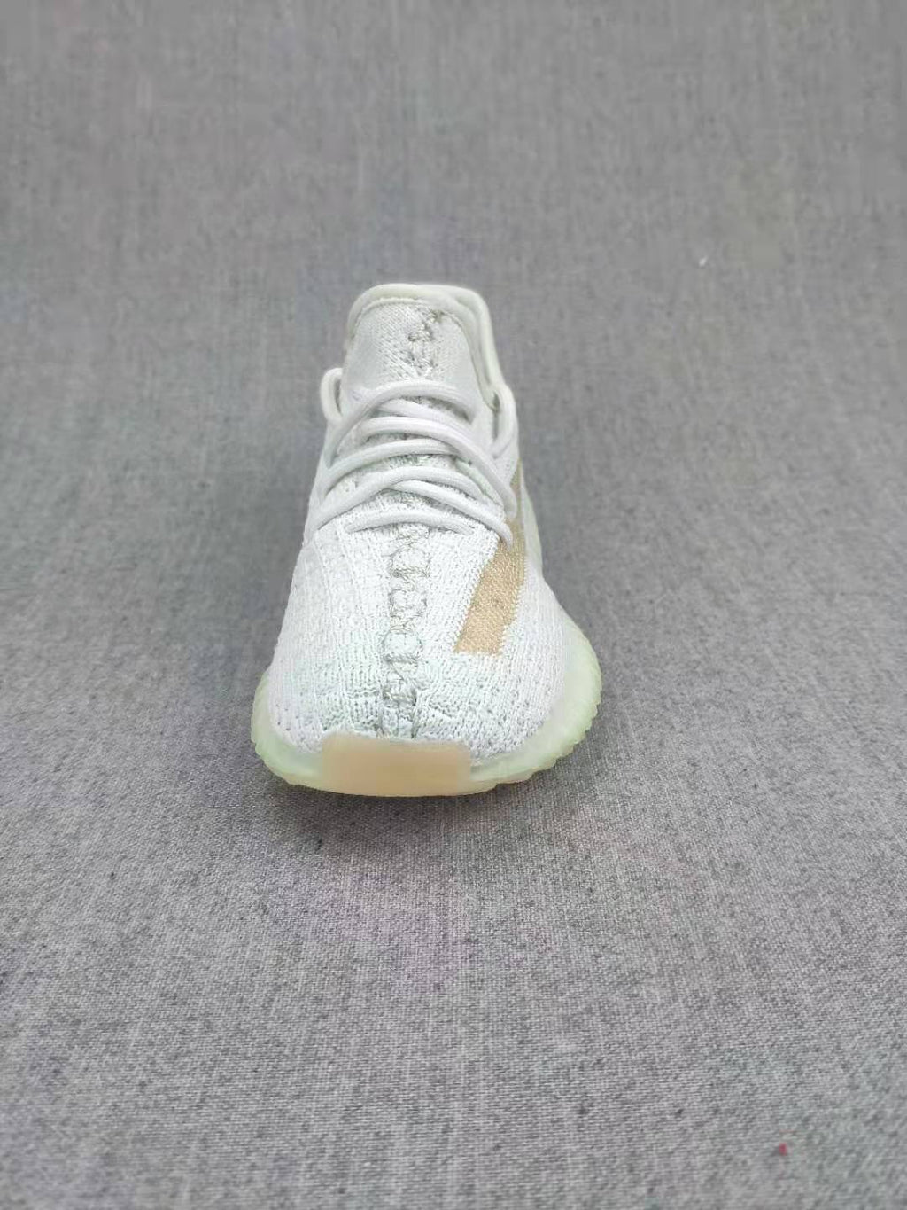 Yeezy Boost 350 V2 Kids Sneakers, in Light Neutral - product image from the listing.