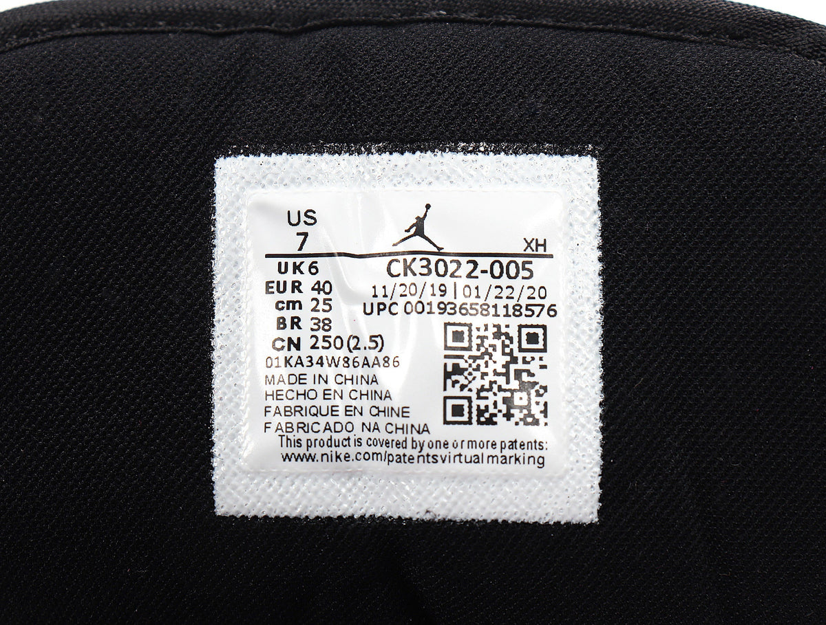 Jordan 1 Low Raspberry Sneakers in Pink Black White CK3022-005 - product image from the listing.