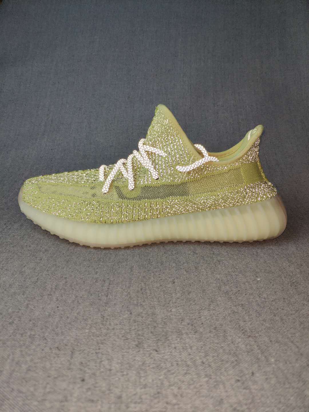 Olive Green and Cream Yeezy 350 V2 Knit Sneakers - product image from the listing.