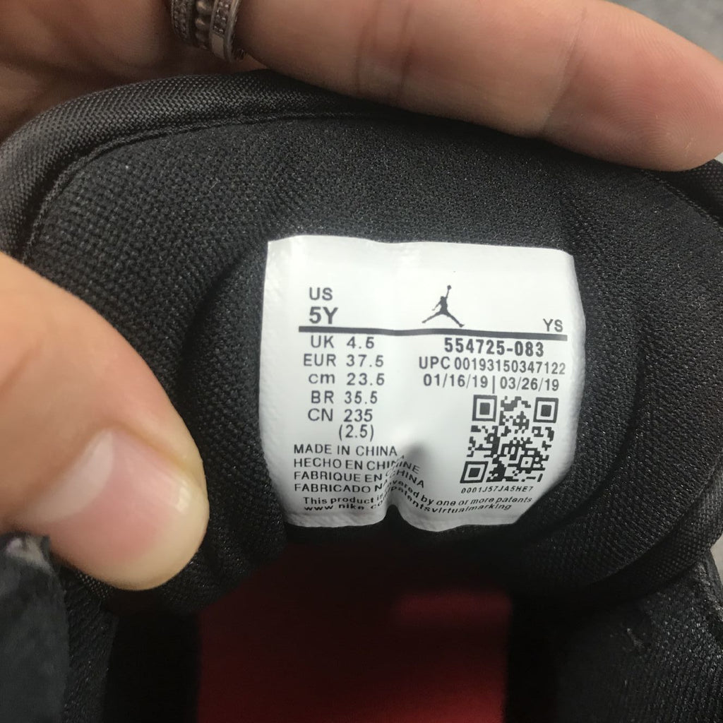 Jordan 1 Mid Sneakers in Multicolor Black 554725-083 - product image from the listing.