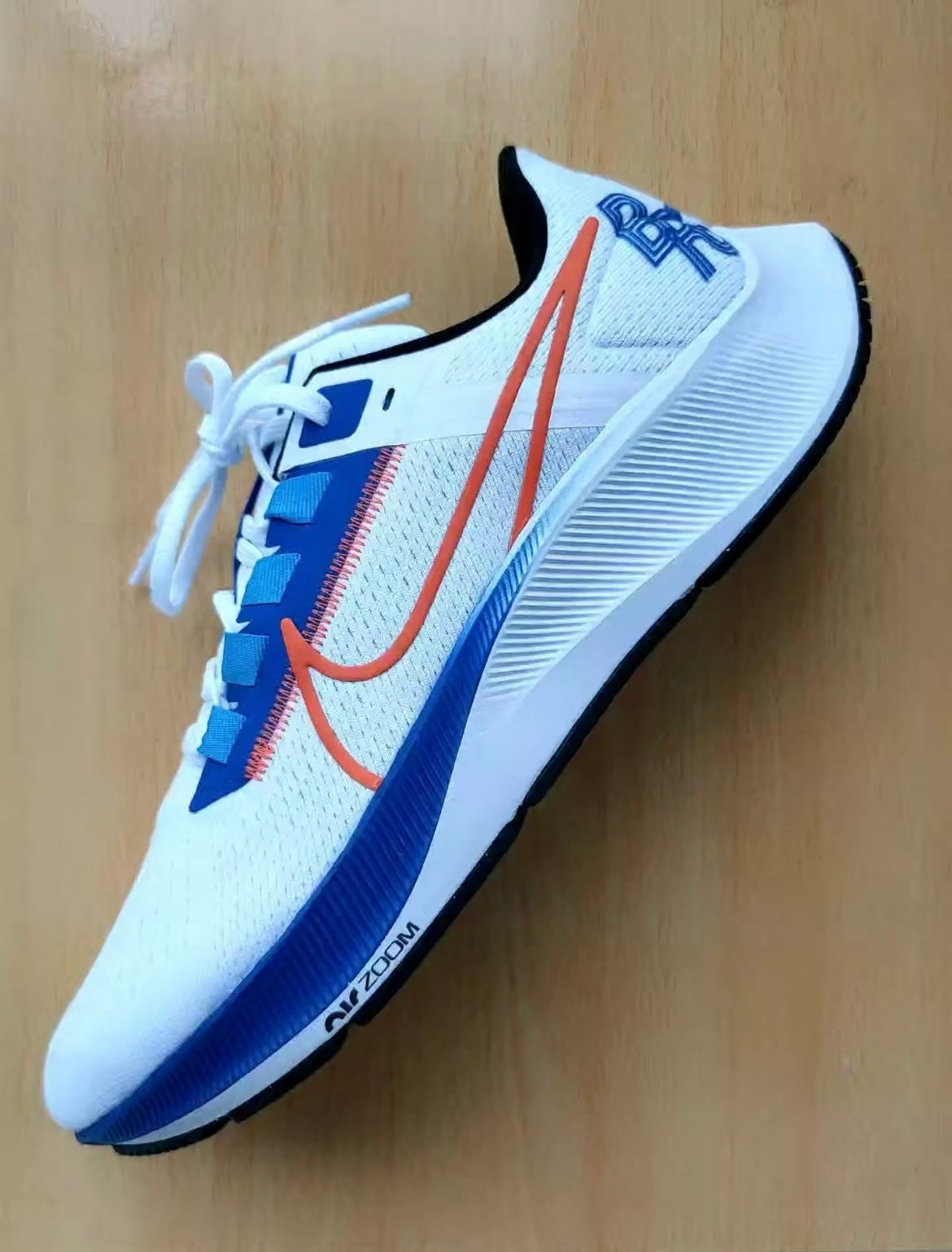 Nike Air Zoom Pegasus 38 Running Shoes in White Blue DQ8575-100 - product image from the listing.