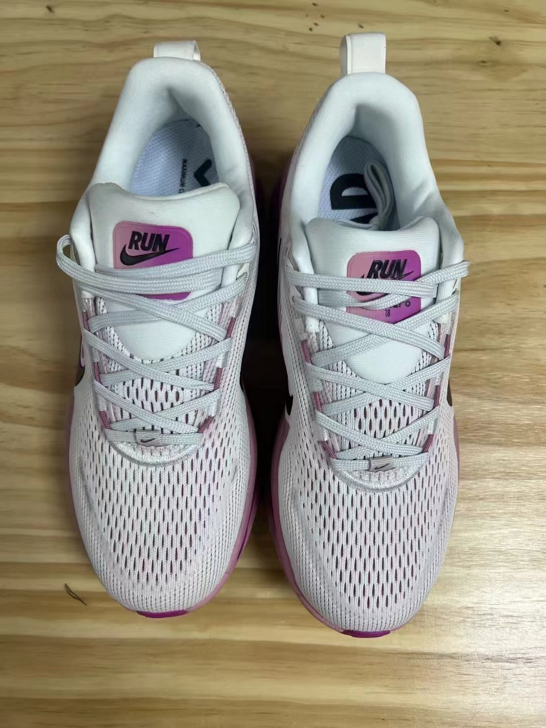 Nike Vomero 18 Running Shoes in White Pink - product image from the listing.