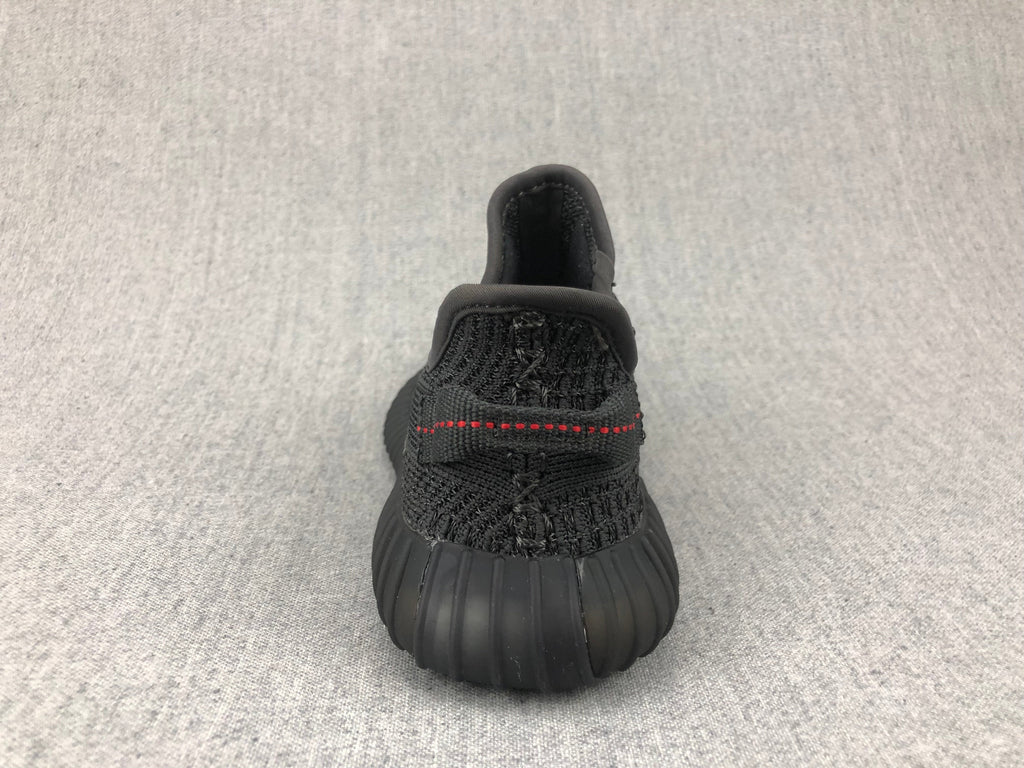 Black Yeezy 350 V2 Kids Sneakers - product image from the listing.