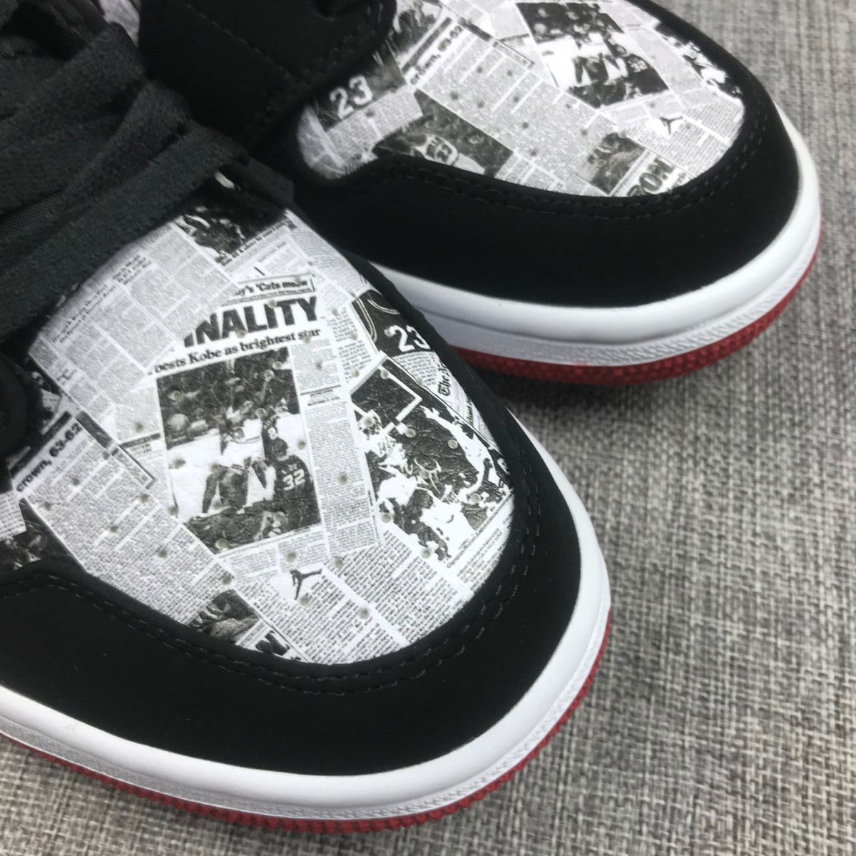 Air Jordan 1 Mid Sneakers in Black Red 852542-061 - product image from the listing.
