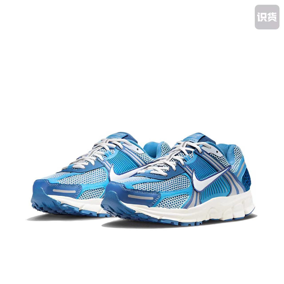 Nike Zoom Vomero 5 Sneakers in White Blue Silver - product image from the listing.