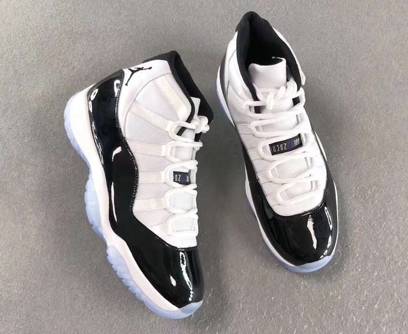 Air Jordan 11 Concord Black White Sneakers - product image from the listing.
