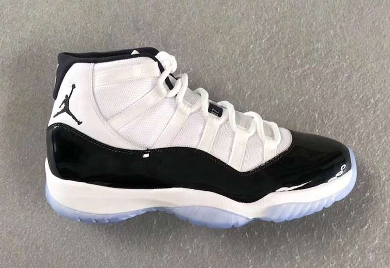 Air Jordan 11 Concord Black White Sneakers - product image from the listing.
