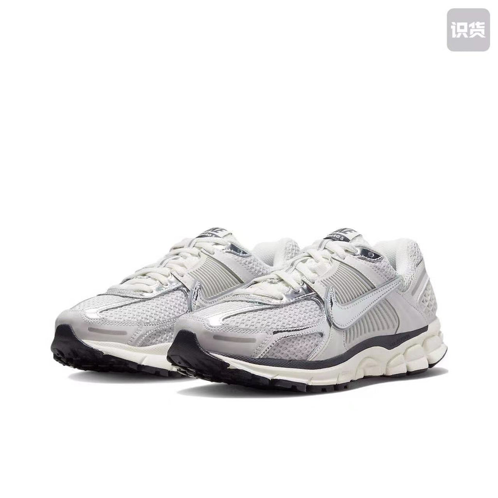 Nike Air Max Plus 3 Sneakers in Silver Grey and White - product image from the listing.