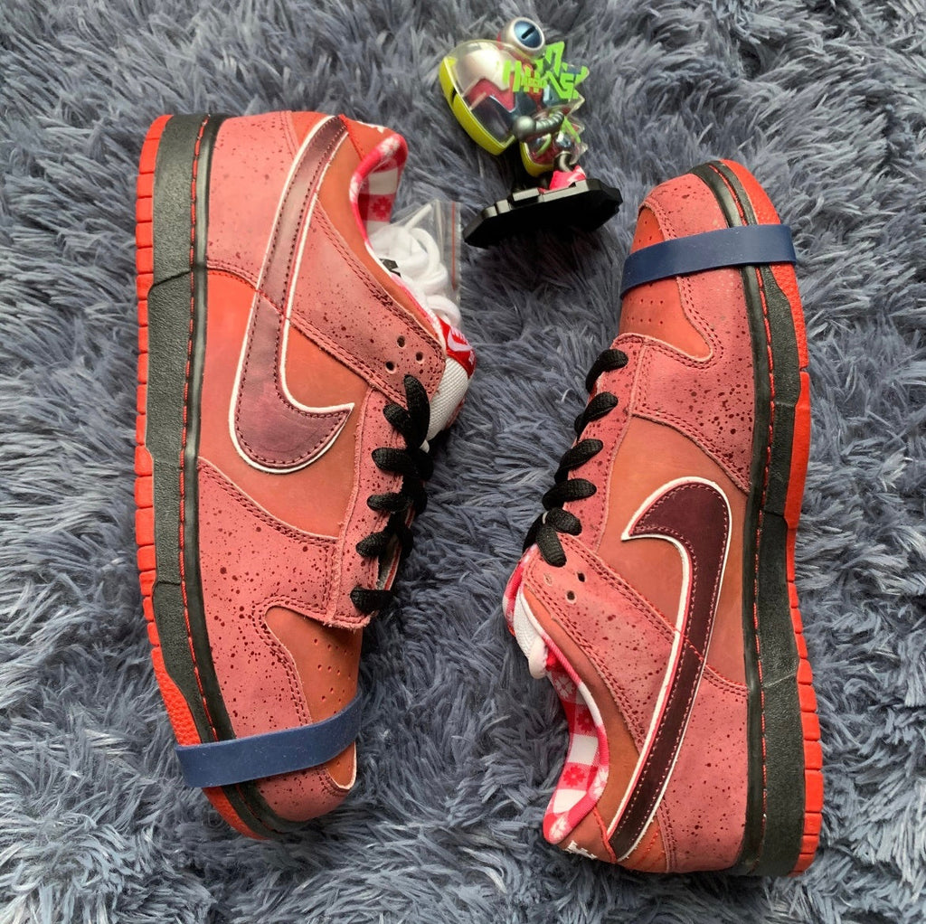 SB Dunk Low Concepts Red Lobster 313170-661 by Nike - product image from the listing.