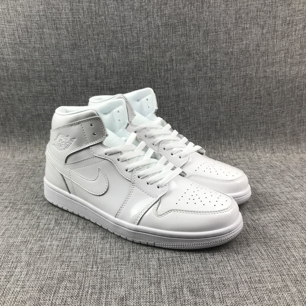 Air Jordan 1 Mid White Patent-Style Sneakers BQ6472-111 - product image from the listing.