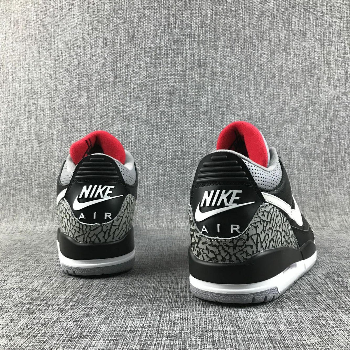 Air Jordan 3 Retro Black Cement Sneakers, in Black and Grey - product image from the listing.