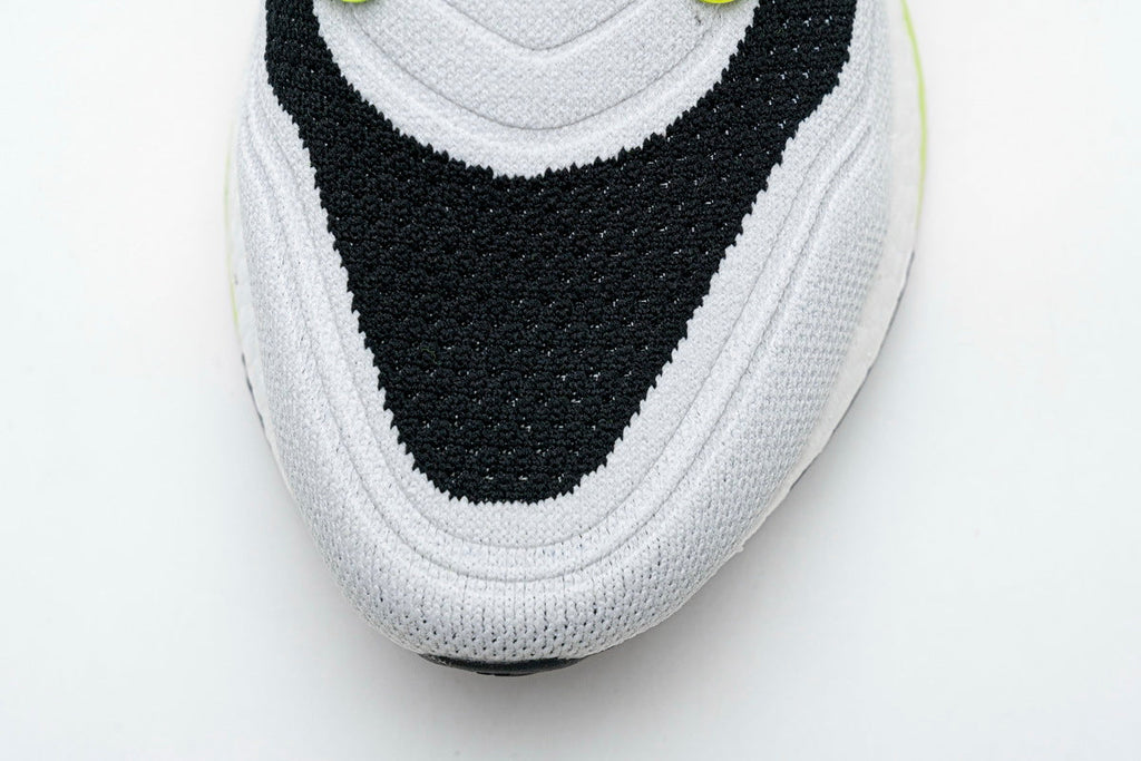 adidas UltraBoost 21 Running Shoes, in White and Volt FY1214 - product image from the listing.