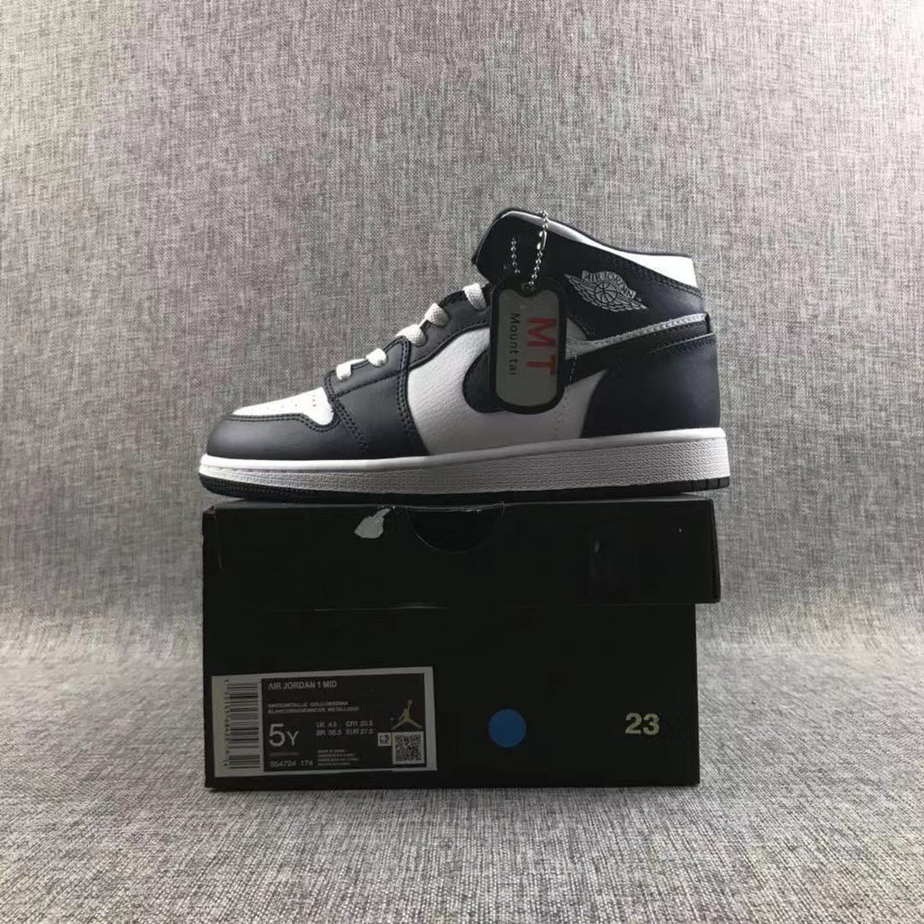 What The Obsidian Sneakers - Jordan 1 Mid 554724-174 - product image from the listing.