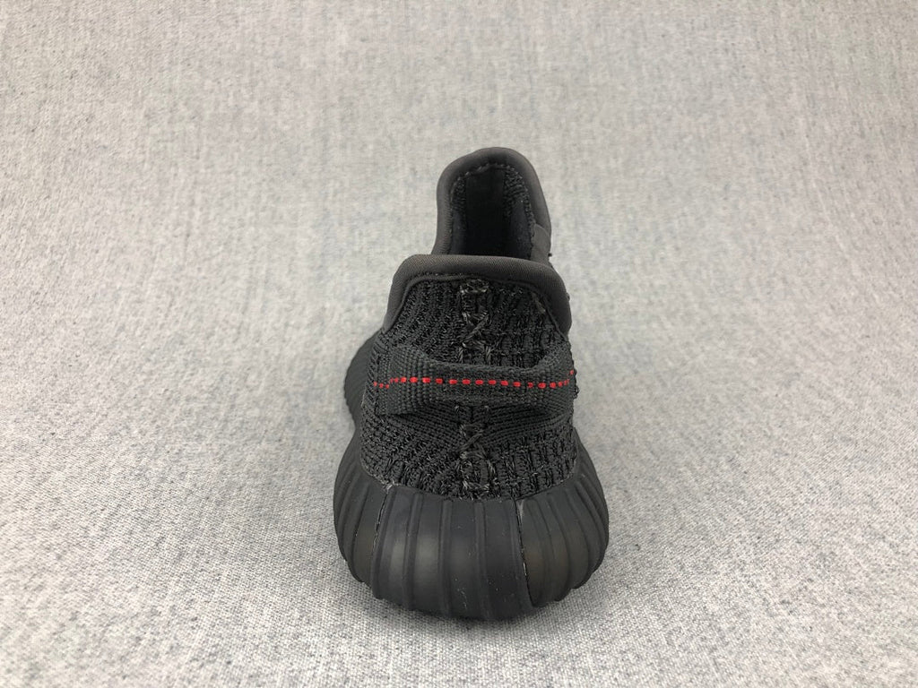 Black Yeezy 350 V2 Kids Sneakers - product image from the listing.