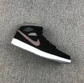 Air Jordan 1 Mid Sneakers in Black Grey Red 554724-060 - product image from the listing.