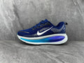 Navy Blue and White Nike Running Shoes - product image from the listing.