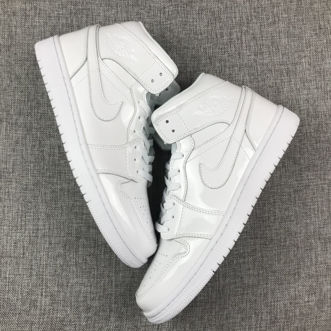 Air Jordan 1 Mid White Patent-Style Sneakers BQ6472-111 - product image from the listing.