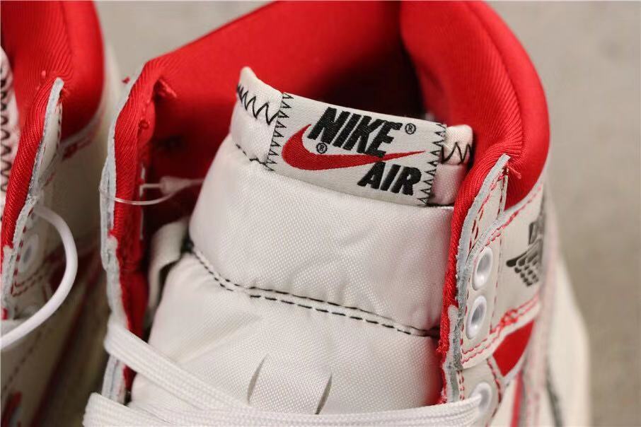 Air Jordan 1 Retro High OG Sneakers in White and Red - product image from the listing.