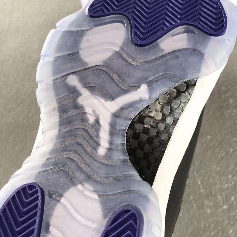 Air Jordan 11 Concord Black White Sneakers - product image from the listing.