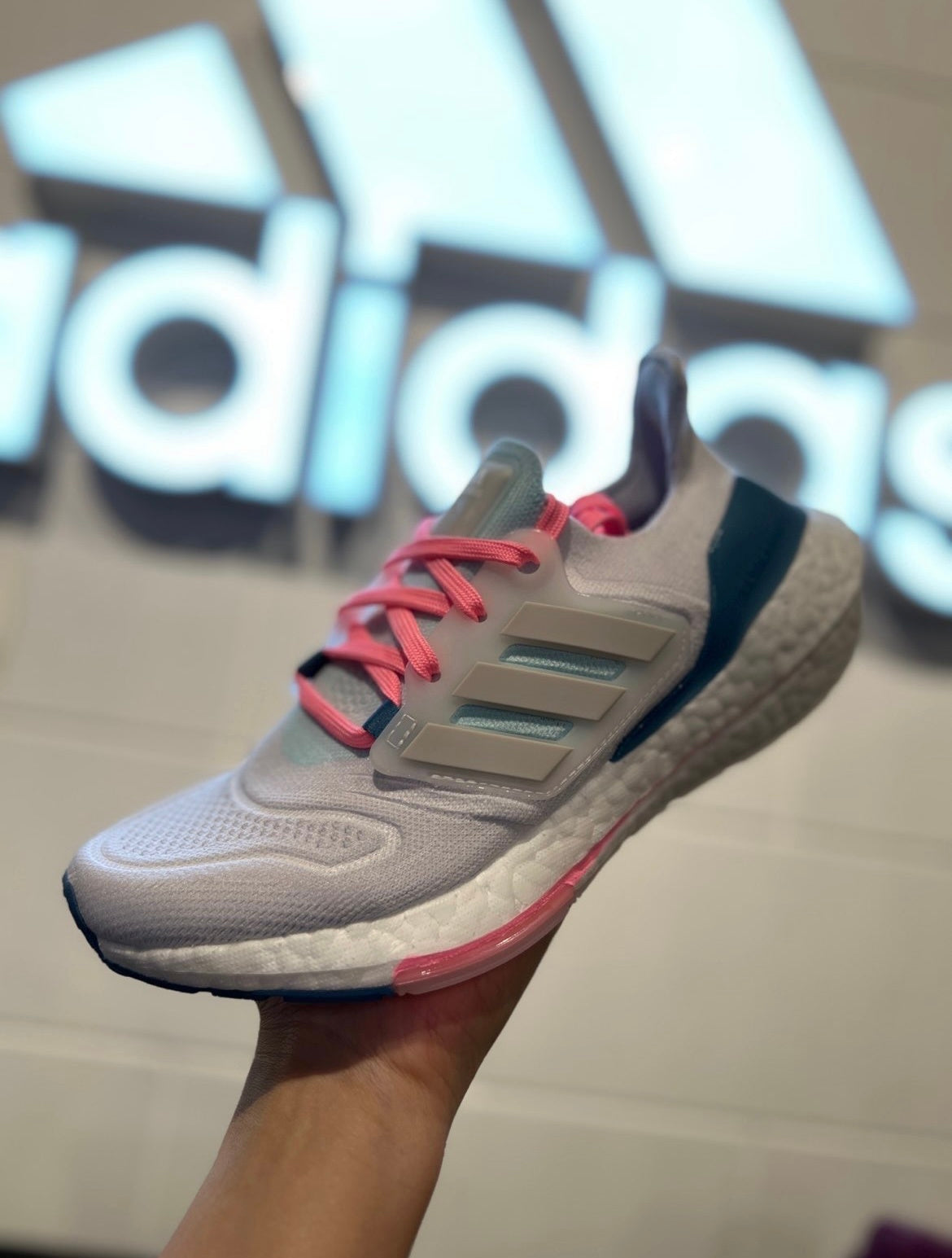 adidas UltraBoost 22 Sneakers GX5929 in White Blue Pink - product image from the listing.