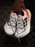 Adidas Ultraboost 23 Running Shoes in White Black Orange HQ6351 - product image from the listing.