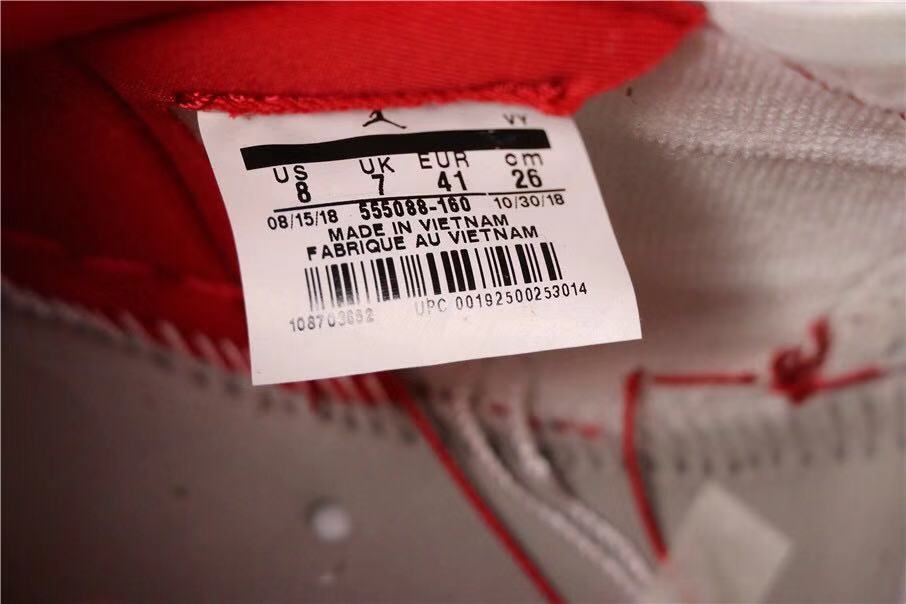 Air Jordan 1 Retro High OG Sneakers in White and Red - product image from the listing.