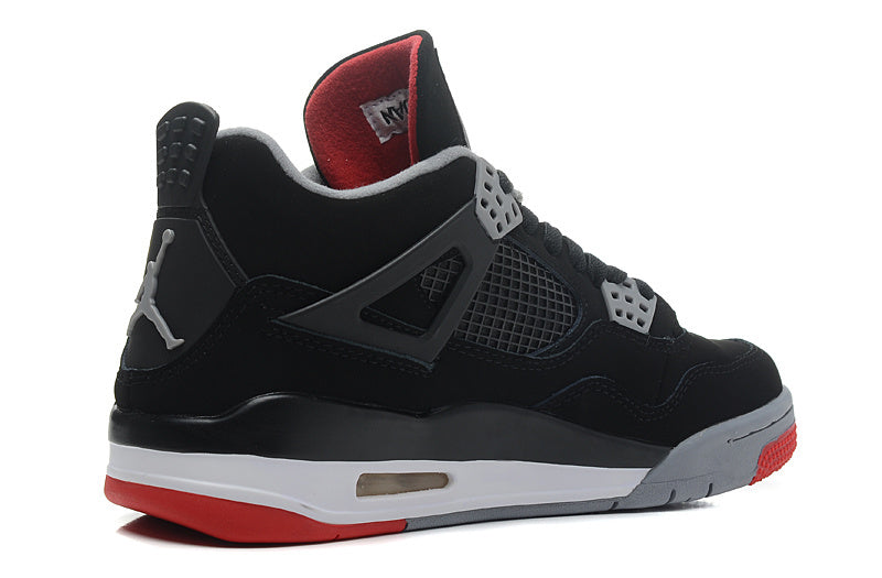 Jordan 4 Retro Basketball Shoes in Black/Red - product image from the listing.