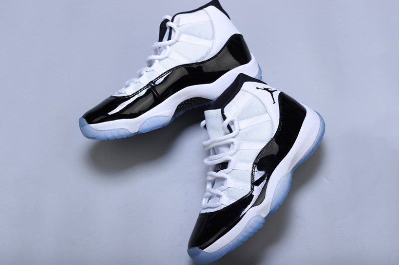 Air Jordan 11 Concord Black White Sneakers - product image from the listing.