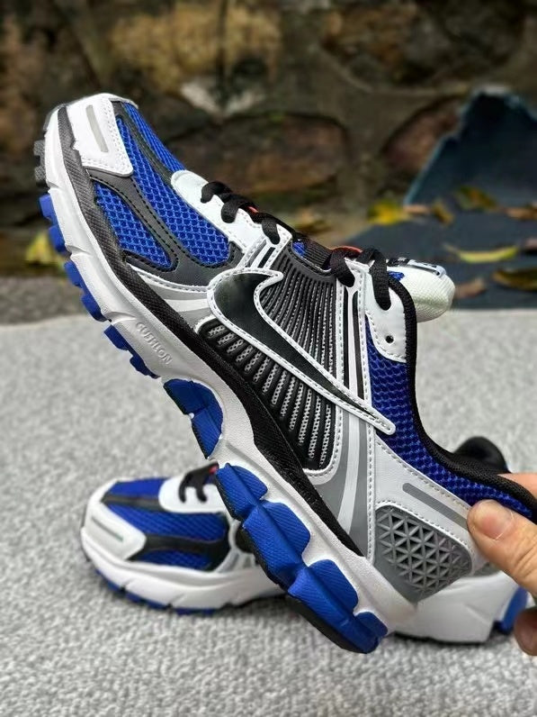 Nike Zoom Vomero 5 Sneakers in Black White Blue - product image from the listing.