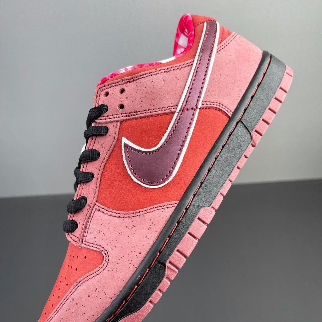 SB Dunk Low Concepts Red Lobster 313170-661 by Nike - product image from the listing.