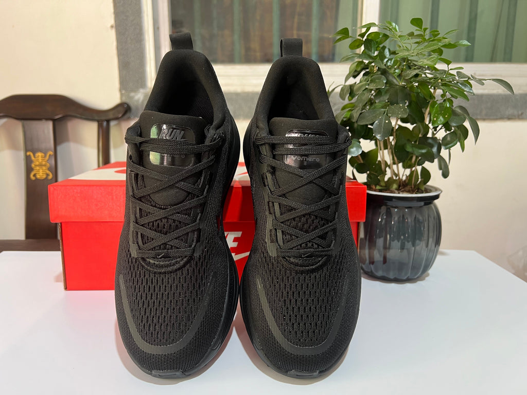 Nike Vomero 18 Running Shoes, in Black and Dark Gray - product image from the listing.