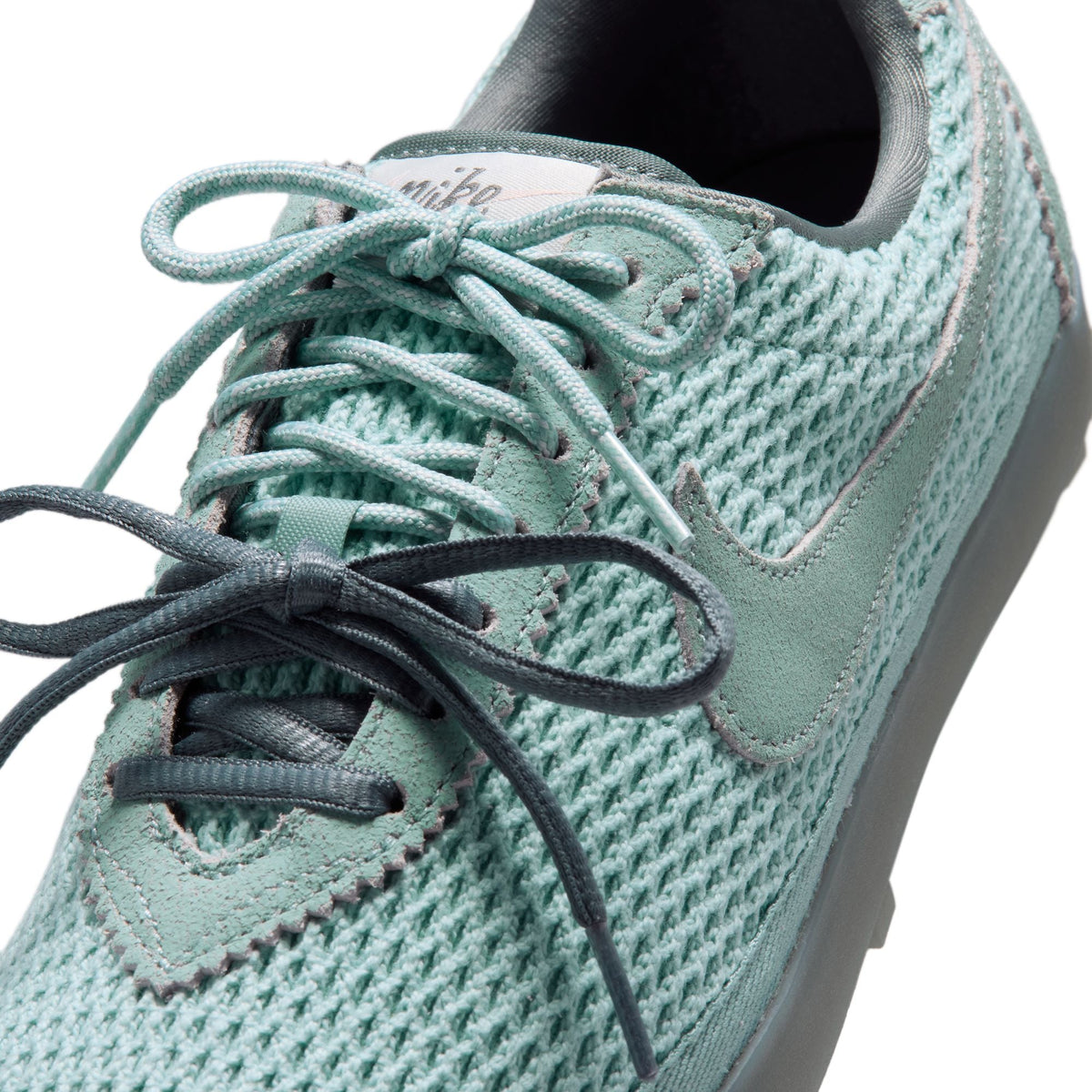 Women's Nike Astrograbber TXT FMME Shoes - product image from the listing.