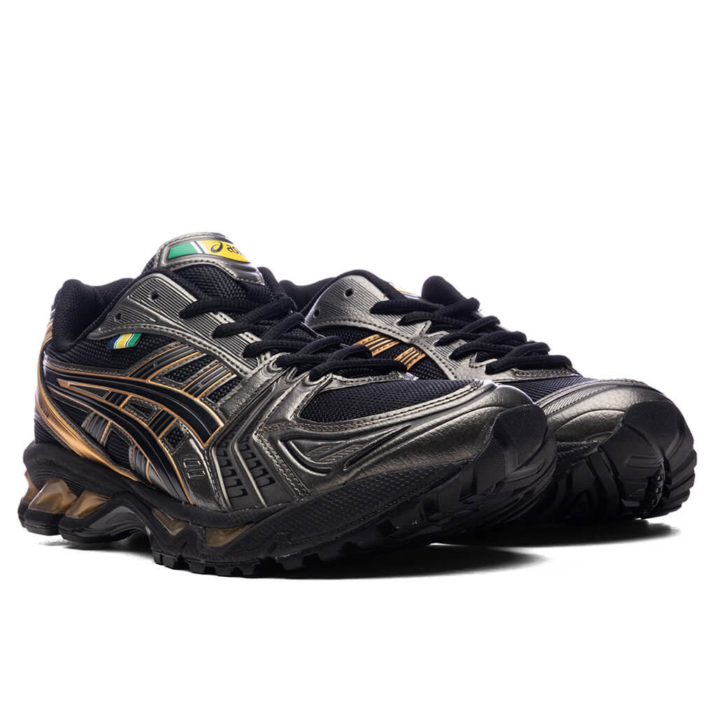 Asics x Ayrton Senna Gel-Kayano 14 in Black/Pure Gold - product image from the listing.