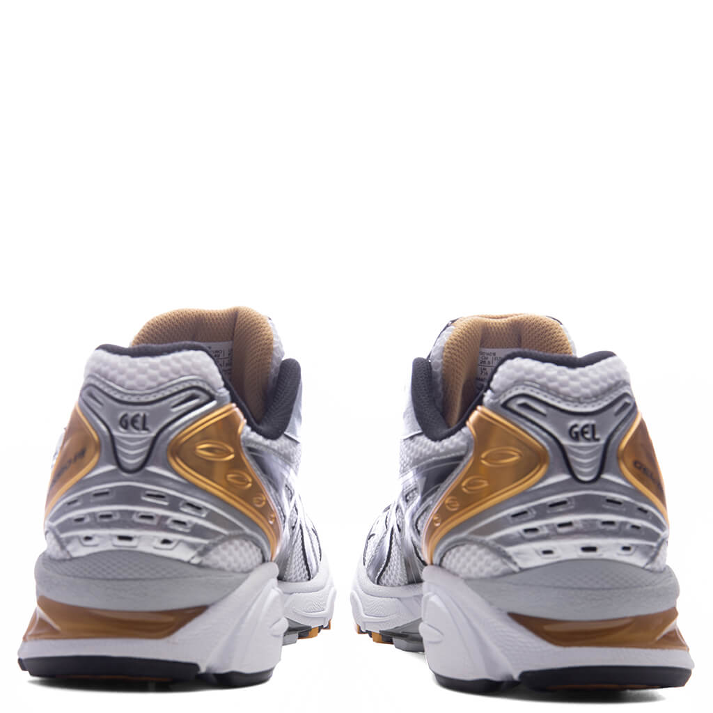 Gel-Kayano 14 in White/Pure Gold - product image from the listing.