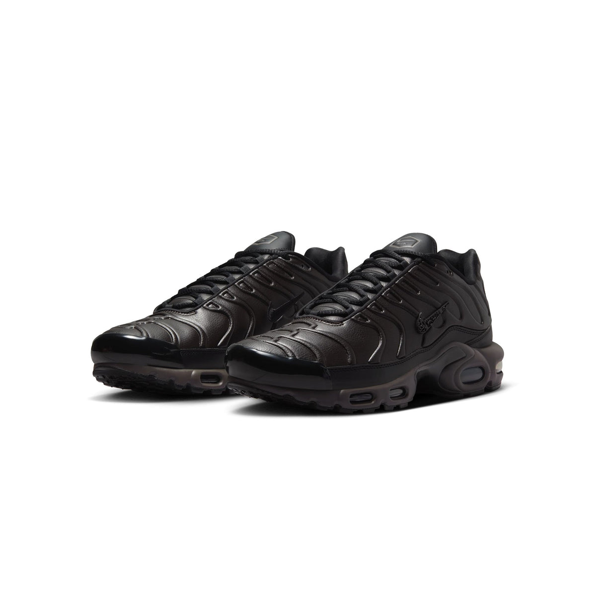 Men's Nike Air Max Plus Premium Shoes - product image from the listing.