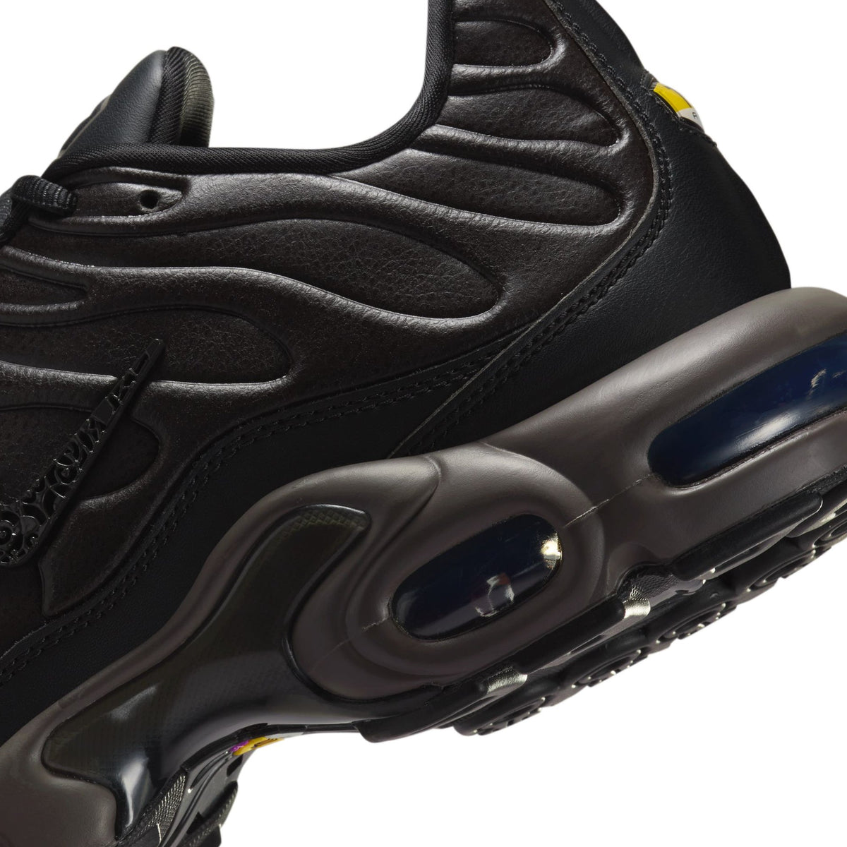 Men's Nike Air Max Plus Premium Shoes - product image from the listing.
