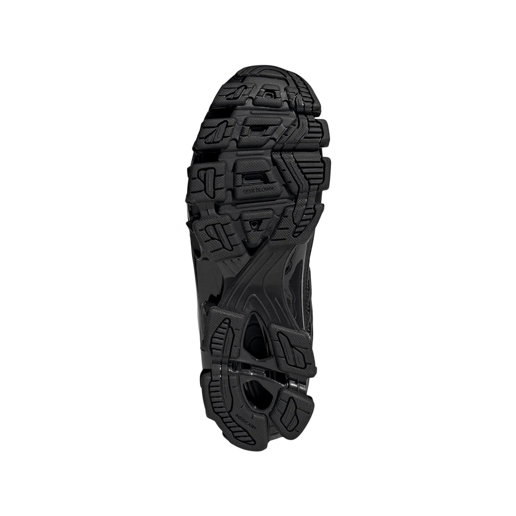 Megaride F50 (Core Black/Iron Metallic) by adidas - product image from the listing.