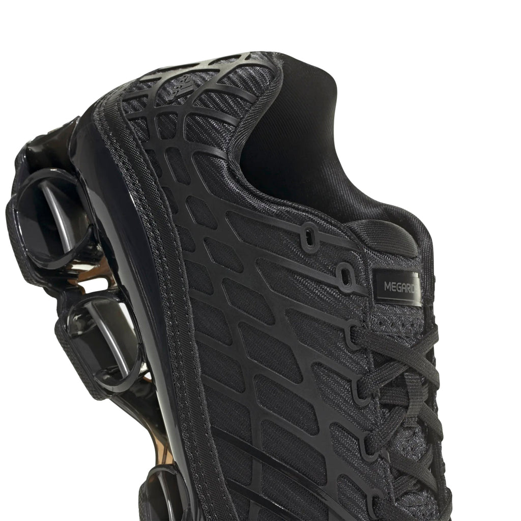 Megaride F50 (Core Black/Iron Metallic) by adidas - product image from the listing.
