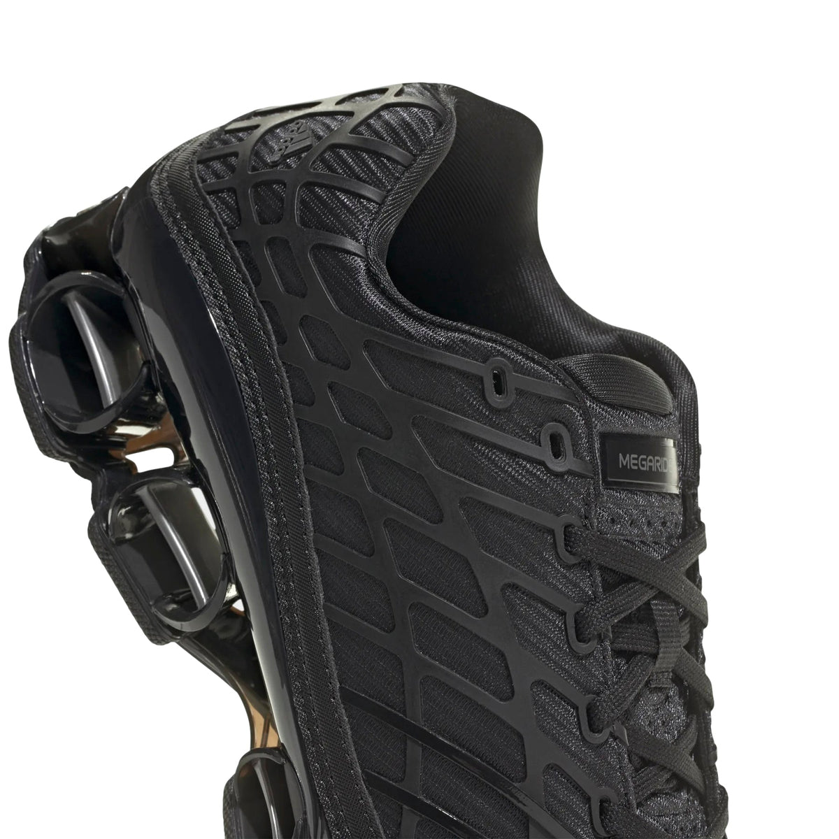 Megaride F50 (Core Black/Iron Metallic) by adidas - product image from the listing.