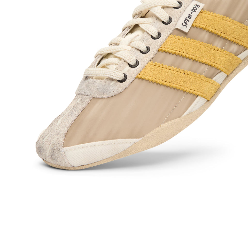 Tokyo W SFTM (Off White/Preloved Yellow/Core Black) by adidas - product image from the listing.
