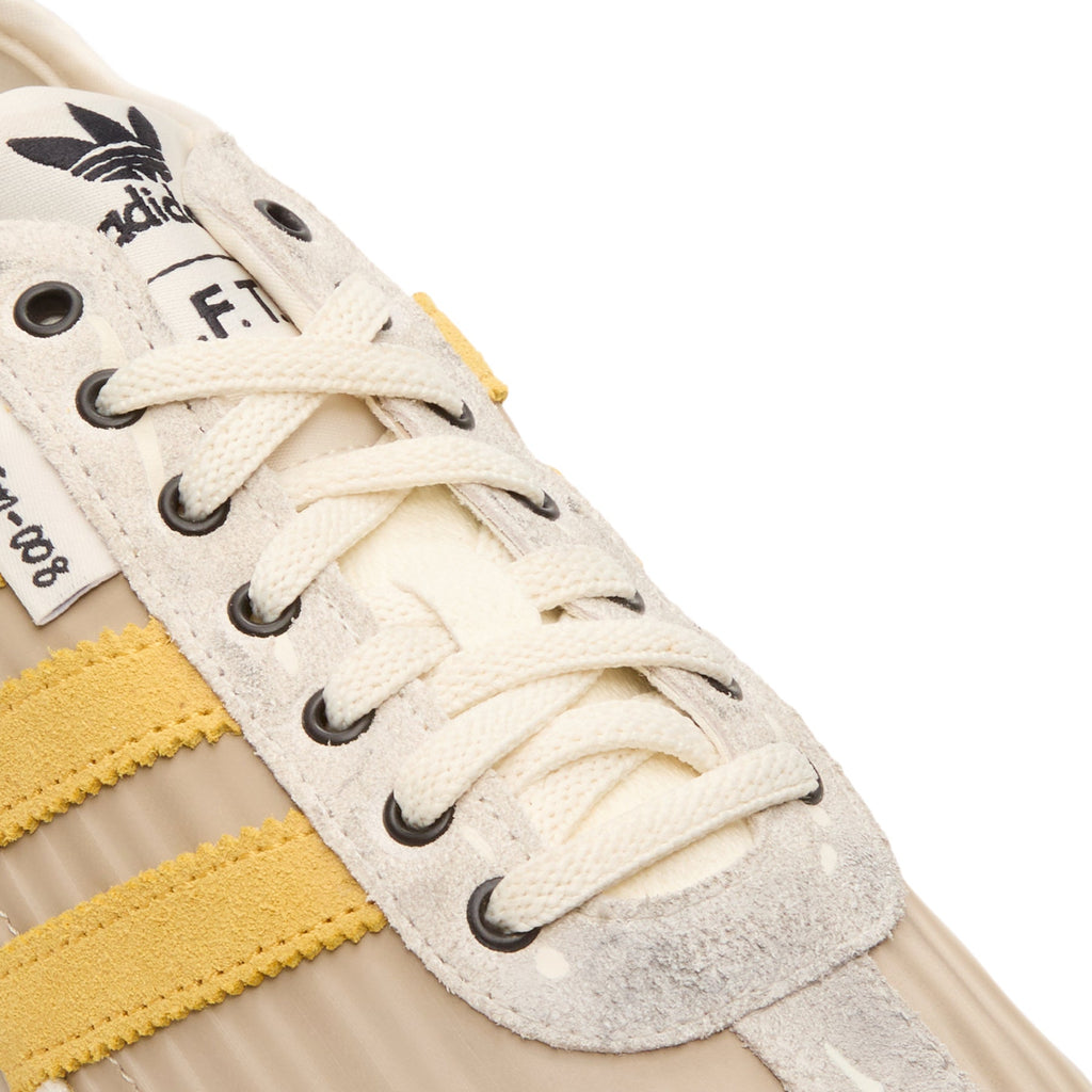 Tokyo W SFTM (Off White/Preloved Yellow/Core Black) by adidas - product image from the listing.
