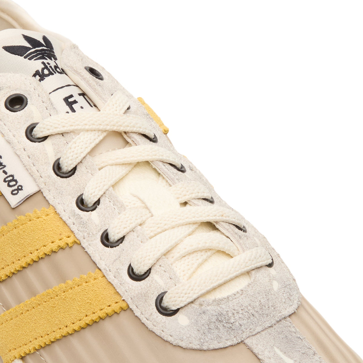 Tokyo W SFTM (Off White/Preloved Yellow/Core Black) by adidas - product image from the listing.