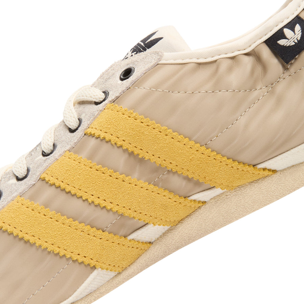 Tokyo W SFTM (Off White/Preloved Yellow/Core Black) by adidas - product image from the listing.